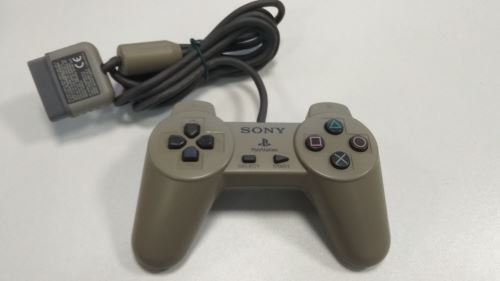 [PS1] Drátový Ovladač Sony Dualshock - bez páček - khaki