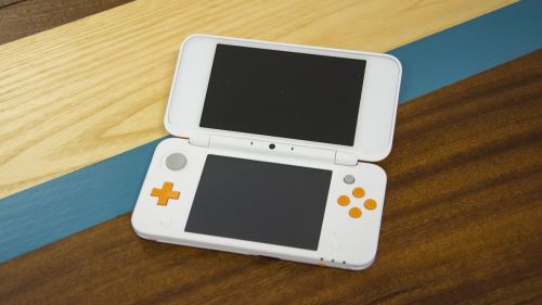 New Nintendo 2DS XL - žlutobílé (estetická vada) + originální balení
