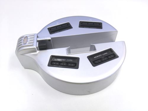 [PS2] Slim HUB stojan na 4 paměťové karty a ovladače - stříbrný (estetická vada)