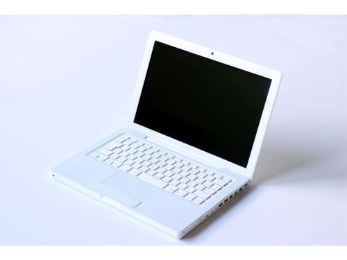 Apple Macbook 2004 (A1181) (nefunkční baterie, japonská klávesnice, estetické vady)