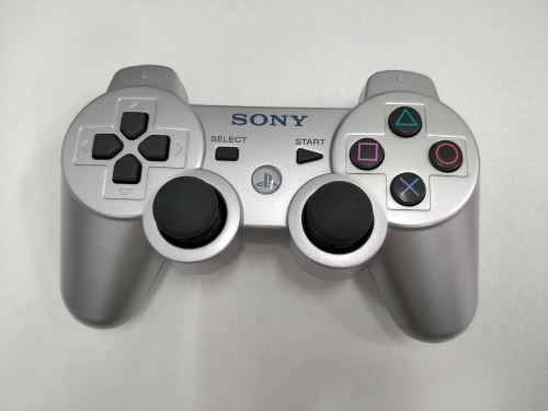 [PS3] Bezdrátový Ovladač Sony Dualshock - stříbrný (různé estetické vady)