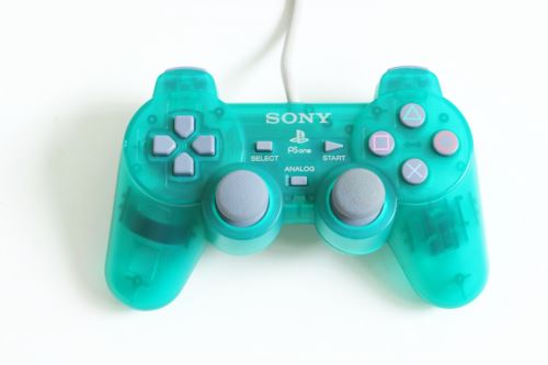 [PS1] Drátový Ovladač Sony Dualshock - smaragdový průhledný (estetická vada)