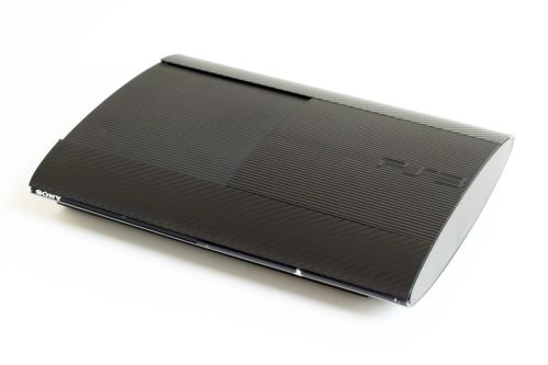 PlayStation 3 500 GB Super Slim - černý Carbon (estetická vada)